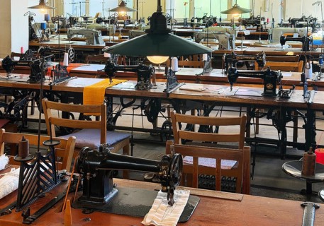 Museum laundry factory, sewing room, industrial sewing machines and knitting machines come almost