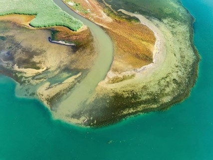Aerial view, top-down view of the mouth of the Stockacher Aach at low tide flowing into Lake