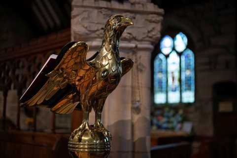 Interior view, brass raptor, eagle lectern, parish church St Just in Penwith, Cornwall, England,