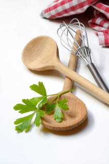 Cooking spoon and parsley, herb, Petroselinum crispum