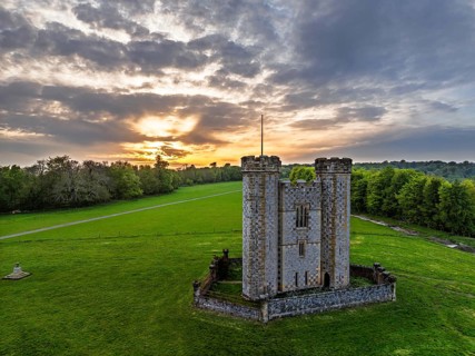 Sunset over Hiorne's Tower from a drone, Arundel, West Sussex, England, United Kingdom