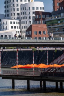 Building in the media harbor in Düsseldorf, terrace of the Lido-Hafen restaurant, Neuer Zollhof,