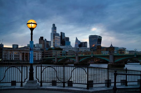Glowing lantern in front of the river Thames, skyline, financial district, financial district,