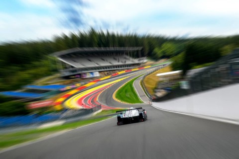 Photo with speed effect from perspective view of racing car racing car drivers for motorsport at