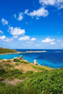 Coastline with emerald green and blue water on a sunny day at Santa Teresa di Gallura, Sardinia,
