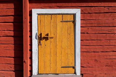 Door, old wooden house, church house at Mantojärvi, Utsjoki or Ohcejohka, Lapland, Finland