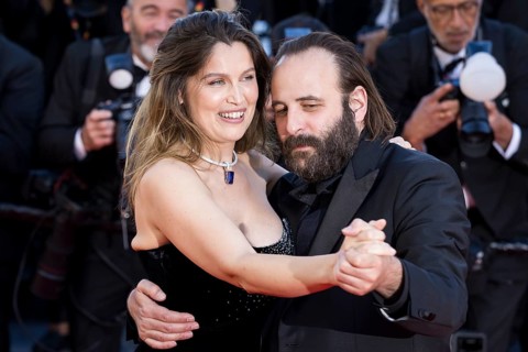 Laetitia Casta and Vincent Macaigne dance with Karma on the Red Carpet of the Palais des Festivals