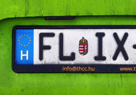 Car license plate FL IX of a FlixBus from Hungary with the characteristic green color, detail,