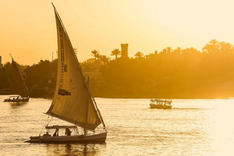 Sailing ships, feluks on the Nile, sunset, Luxor, Egypt