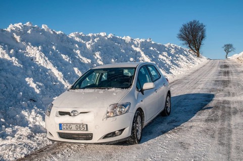 Winter, car on snow-cleared country road in Ystad municipality, Skåne county, Sweden, Scandinavia