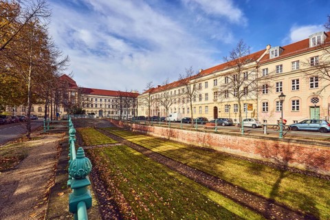 Old city canal, drained historic canal, historic residential buildings, residential buildings,