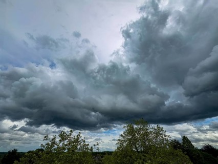 Dark cloud front with Nimbostratus classic rainlayer cloud Thunderstorm potential following