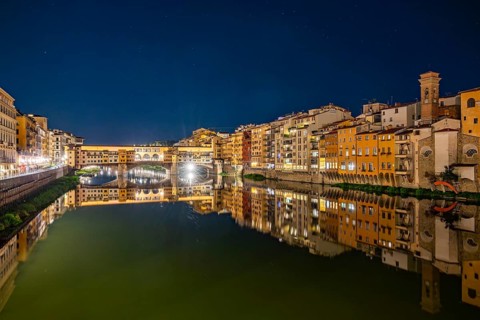 Ponte Vecchio bridge over Arno River at sunset, Florence, Tuscany, Italy