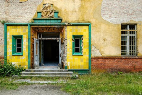 Dilapidated portal in a dilapidated building in the complex of the former Pulmonary Hospital and