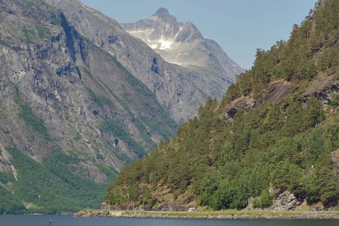 Large mountains with snow-capped peaks and a lake in the foreground, proportions, Eikesdalen,