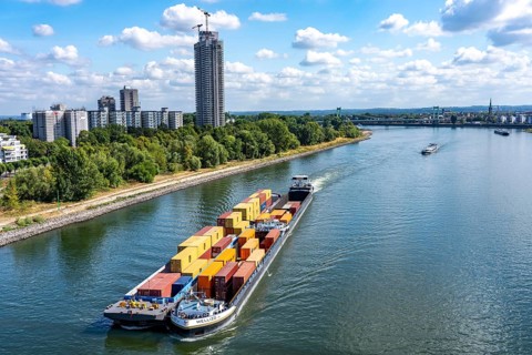 Low water in the Rhine near Cologne, looking north, Mülheimer Rheinbrücke, container freighter