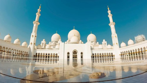 Abu dhabi, UAE, 3rd october, 2022: Grand Mosque in Abu Dhabi mid day in hot weather. Wide low angle