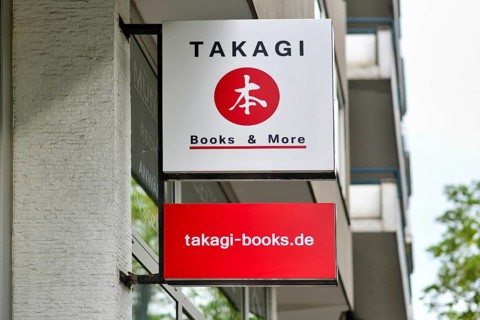 Düsseldorf, Germany - June 9th 2026: Store sign of Takagi Books Japanese bookstore in Little Little