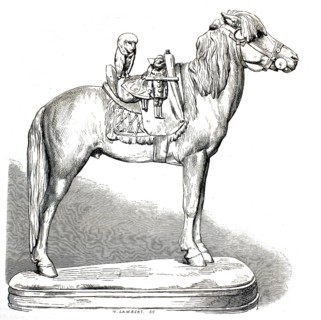 Sculpture of a horse with a saddle with a monkey and a small doll sitting on it. The horse is