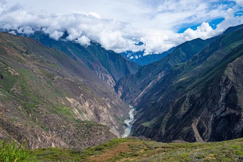 Mountain landscape with clouds, cloud forest near the Inca city of Choquequirao, also Choquequirau
