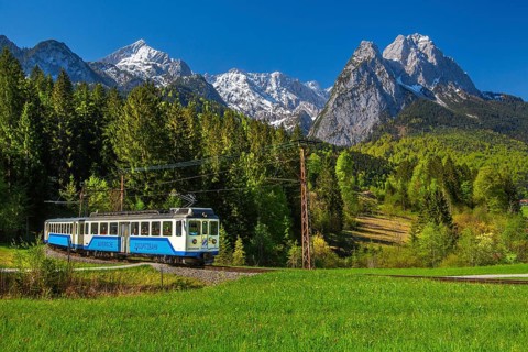 Bavarian Zugspitzbahn rack railway in front of Alpspitze 2628 m and Waxenstein 2277 m in spring,