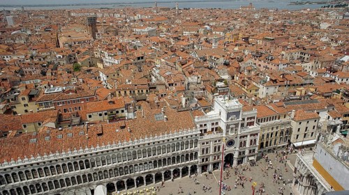 View from above of St. Mark's Square and the rooftops of Venice, Historic Square full of people