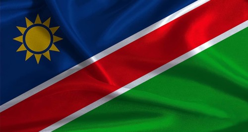 Namibia flag with cloth textured background. National flag of Namibia with realistic texture