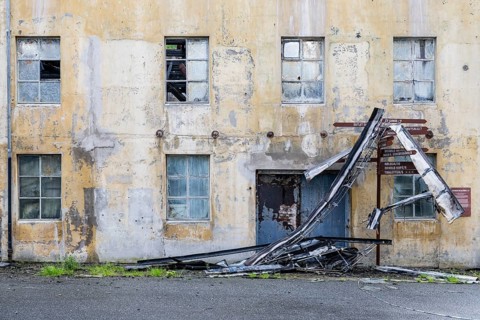 Dilapidated building, historic Devold factory, Devoldfabrikken, outlet center in Langevåg, near