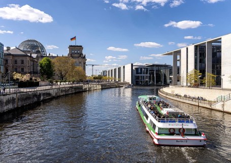 Excursion boat trip on the Spree in Berlin's government district along the Reichstag and the rear