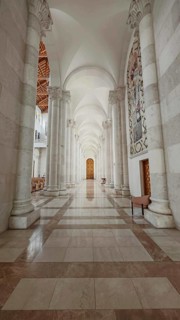 Majestic interior of a mosque with tall marble columns, Pristina, Kosovo