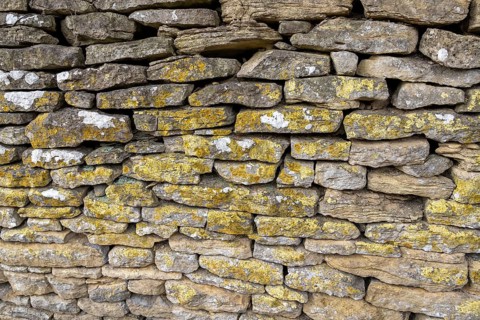 Stone wall, Bibury, The Cotswolds, England, Great Britain