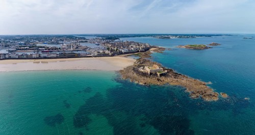 Aerial view, panorama of the historic Fort National island fort on the sandy beach of Saint Malo at
