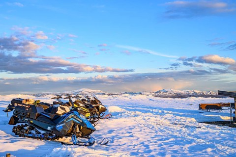 Ljungdalen, Jämtlands län, Sweden, snowmobiles on a wintry area in sunshine and blue sky with some