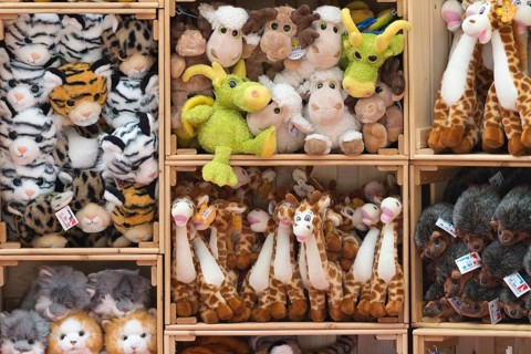 Plush toys stacked on shelves, Nuremberg Zoo, Middle Franconia, Bavaria, Germany