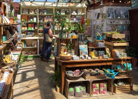Woman shopping In the gift shop, Chelsea Physic Garden, London, England, UK