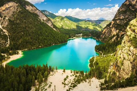 Aerial panorama view Lago di Braies lake in Dolomites mountains. Dolomiti. Italian alps.Turquoise