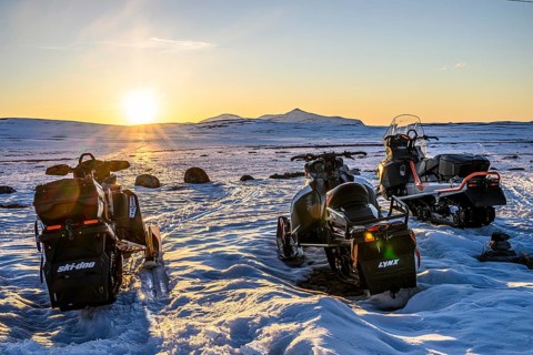 Flatruet, Ljungdalen, Jämtlands län, Sweden, snowmobiles standing on a snowy area at an atmospheric
