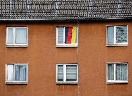 A German flag on an open window of a house, 27.07.2026, Gelsenkirchen, Nordrehein Westphalia,