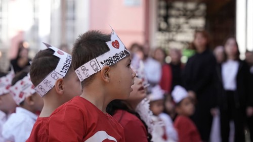 Children celebrate the 102nd anniversary of the Republic Day of Turkey, a national holiday
