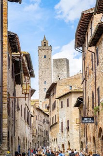 Old Town with stone arches and historic buildings of San Gimignano, Tuscany, UNESCO World Heritage,
