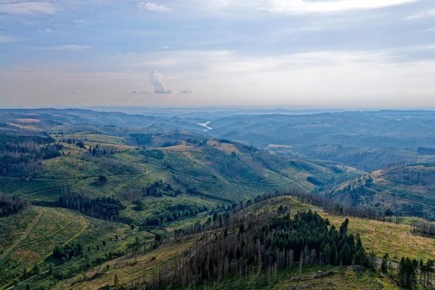Mountain landscape in the Harz nature park Park, and in the distance the Sösestausee. aerial view.