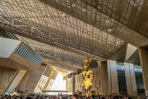 Colossal statue of Ramses II in the entrance hall of the Grand Egyptian Museum in Giza, Egypt