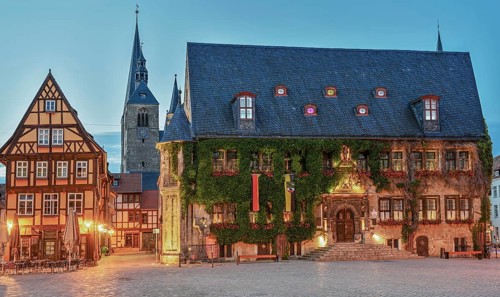 Town hall on the market square illuminates Quedlinburg Harz Germany