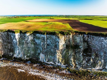 Farm and Fields over Bempton Cliffs from a drone, Yorkshire, England, United Kingdom