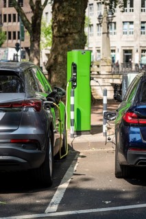 Two cars are charged at a charging station on Königsallee, Düsseldorf, Germany