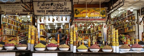 Stalls selling pickled olives, lemons and other vegetables, souk, bazaar, Marrakech, Maghreb,