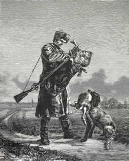 Scene shows a hunter in winter clothes who has shouldered his shotgun and opens a hunting bag.