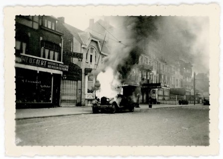 Attack, Resistance, France, Wehrmacht car, burning vehicle on a street in front of a series of