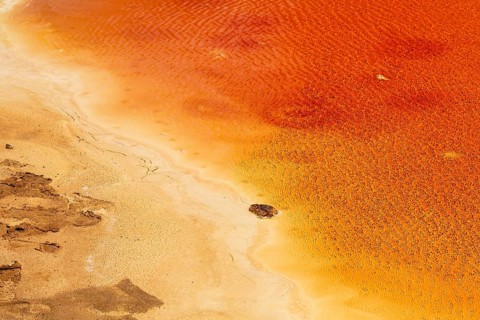 Mazarron mines, former mining, colorful water surface, oxidation of minerals, red waste water,