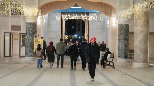 Muslims perform Tarawih prayers at the Millet Mosque, the second largest mosque in Turkey, which is